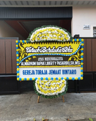 Papan Bunga Duka di Puger